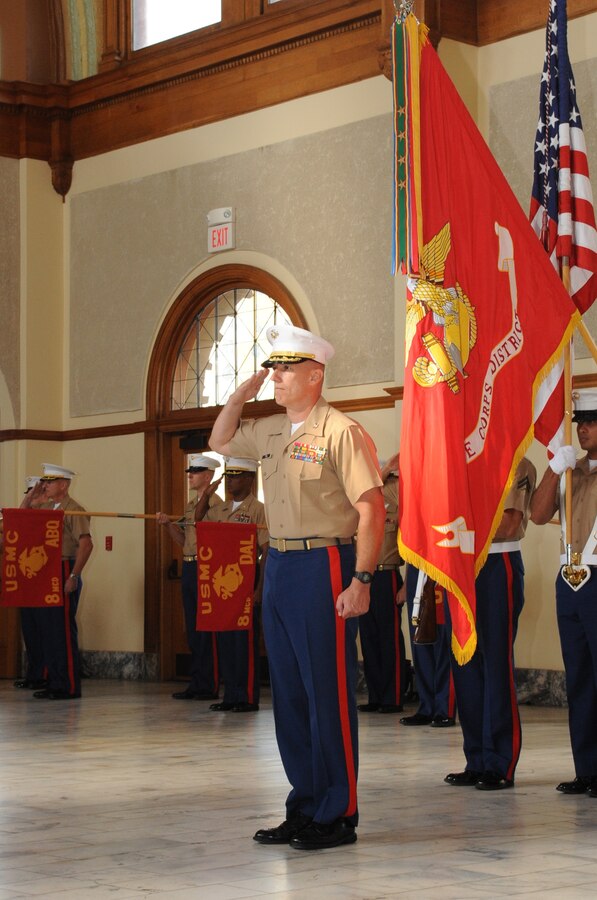 Col. Mark J. Toal salutes Western Recruiting Region Commanding General, Maj. Gen. Ronald L. Bailey, as the colors are presented during the 8th Marine Corps District’s change of command ceremony Thursday at the Ashton Depot in Fort Worth. Toal spent the last three years as the district’s commanding officer  and is now on his way to Marine Corps Base Quantico, Va., to begin his duties as the Chief of Staff for Manpower Personnel Family Readiness Division of Headquarters Marine Corps.